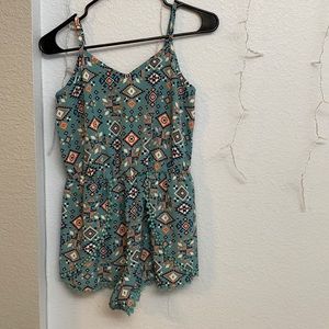 Woman’s blue romper